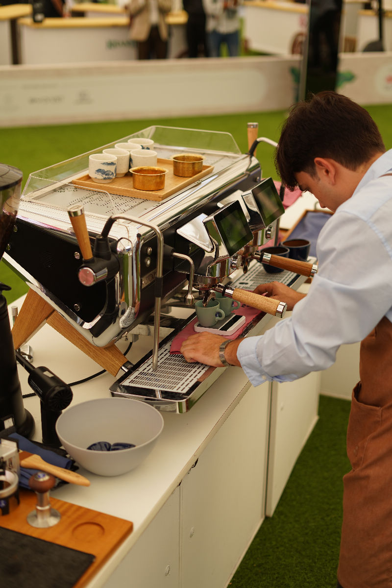 Barista pouring coffee